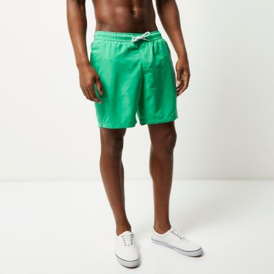 Green drawstring swim shorts